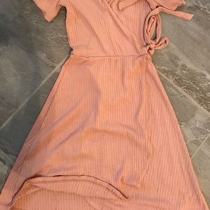Pink low cut tie dress.